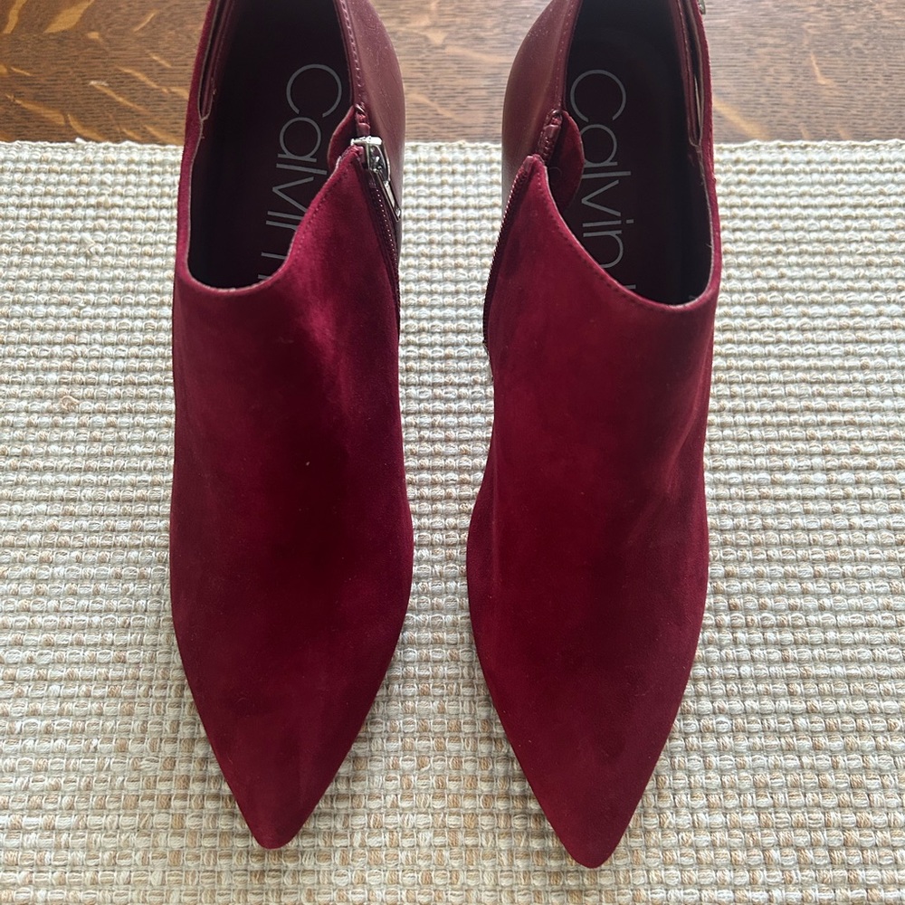 Calvin Klein heeled booties.  Size 9.5. Red suede and leather with zipper, logo.